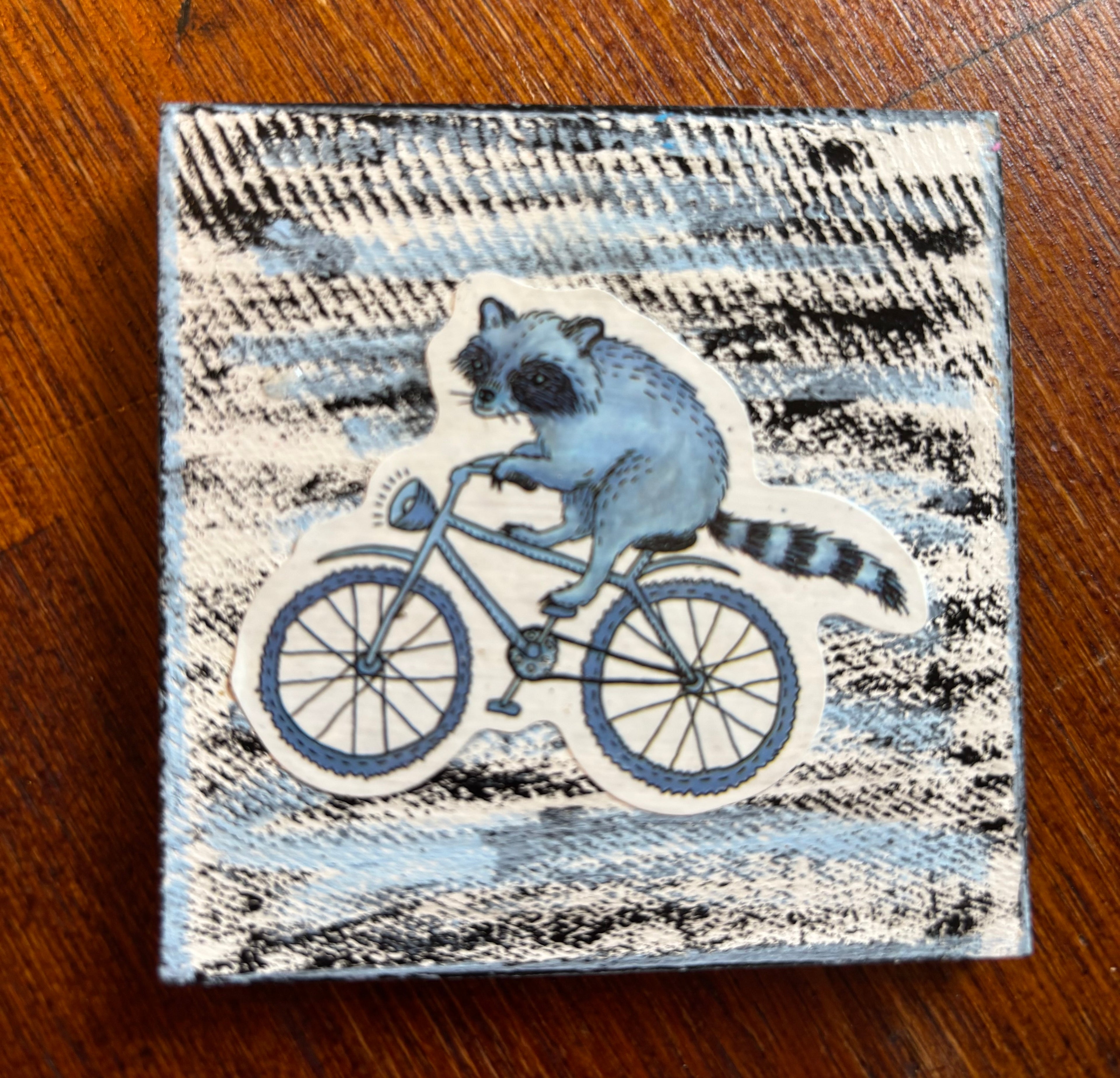 Raccoon on Bike Painted Wood Art