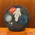 Round Astronaut in Space Art