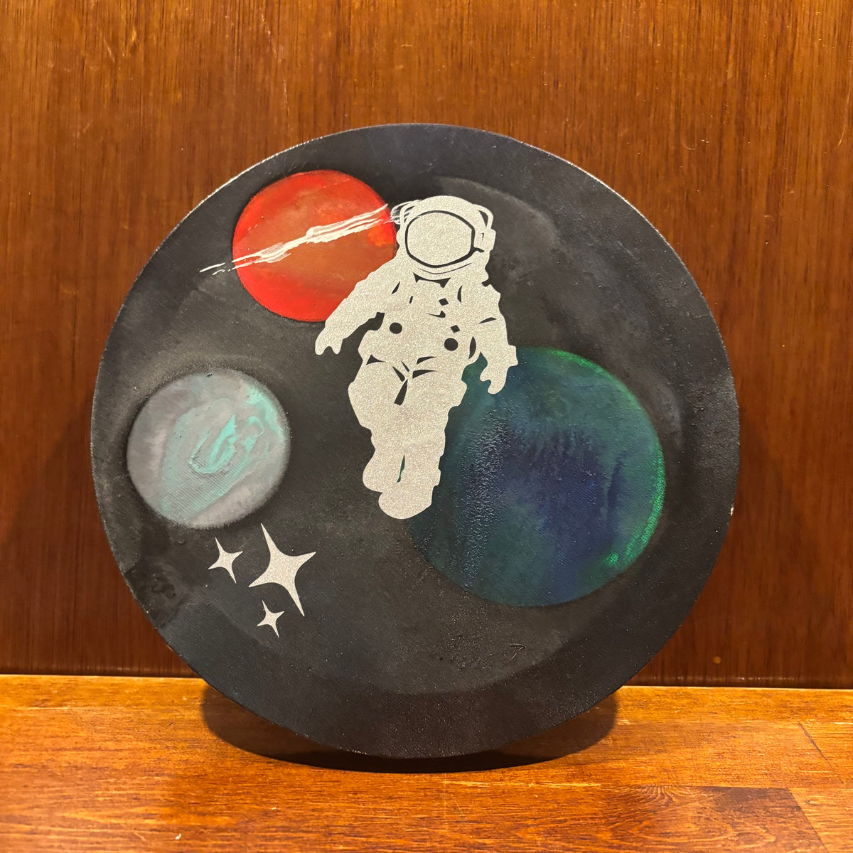 Round Astronaut in Space Art